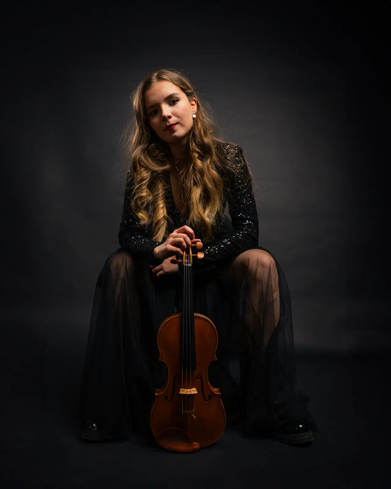 Portret violinistke, sede